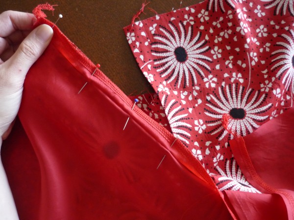 pin the lining to the skirt along zipper opening