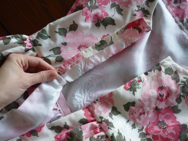 zipper opening edges on bodice are serged