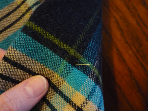 flip the fabric over and see where the pin ends up