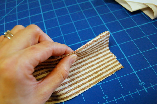 place fold line along a stripe